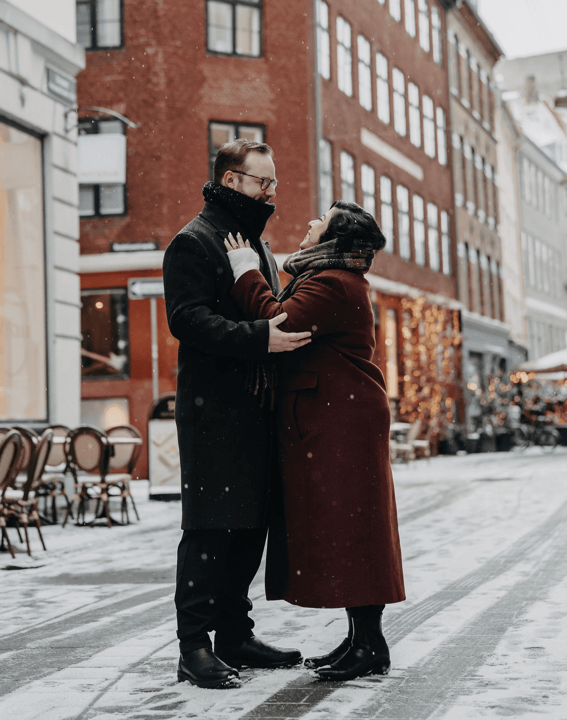 Sarah and Mark share a kiss, enveloped in her flowing veil